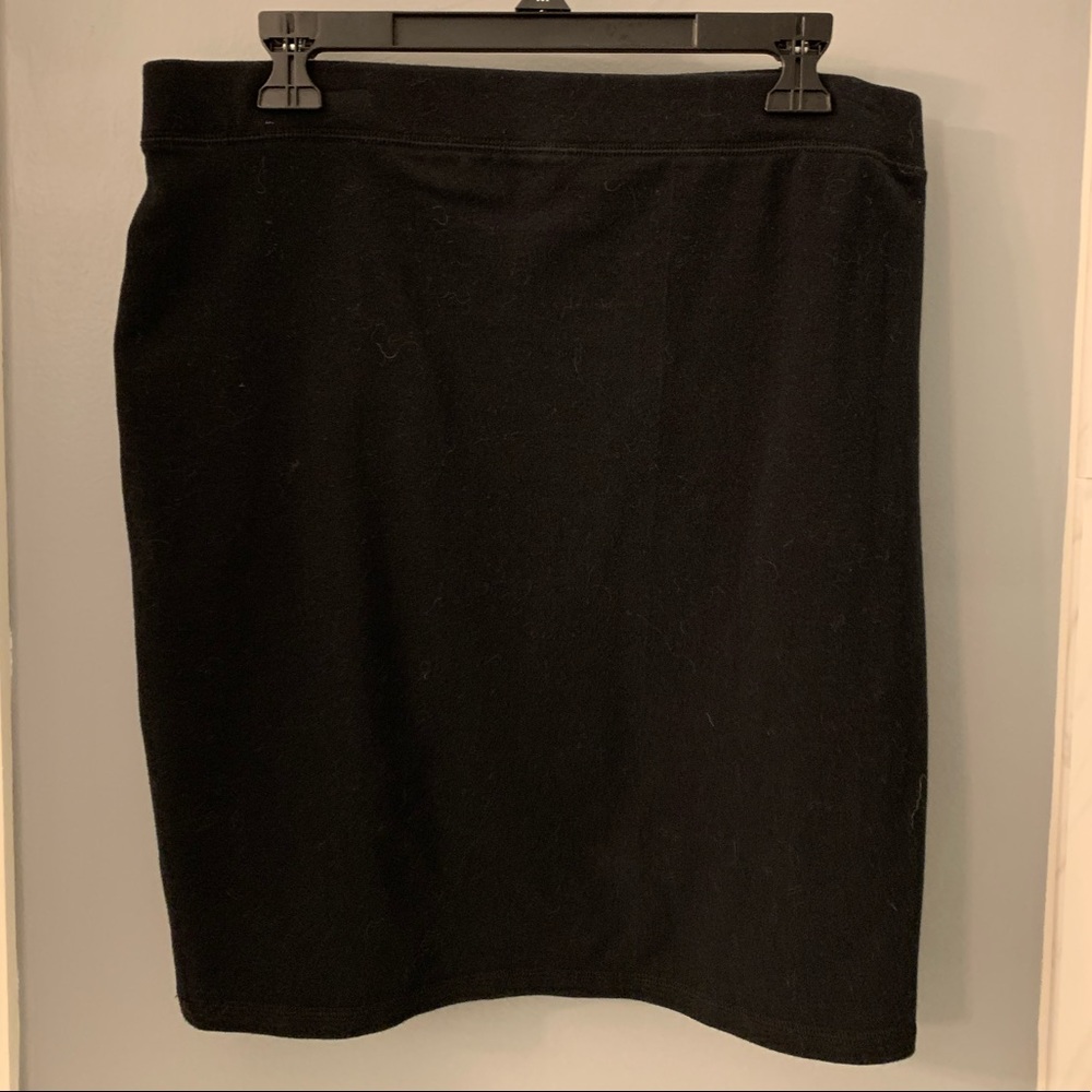 Knee length black skirt
